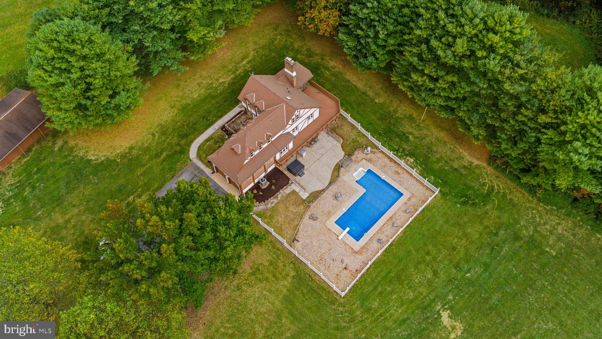 1763 Gablehammer Road Westminster, MD 21157 - Photo 45 of 51 an aerial view of a house with a yard and trees