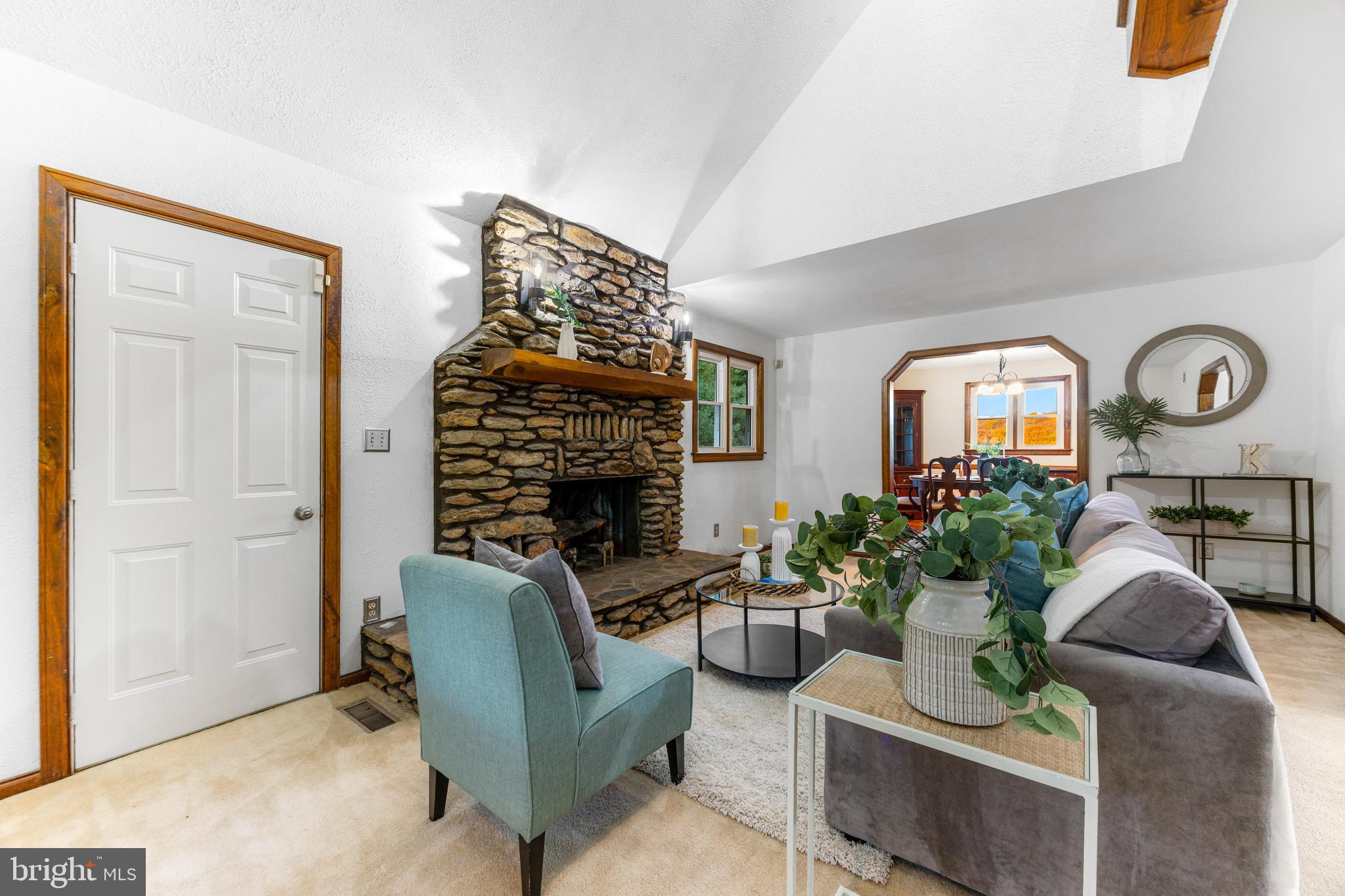 1763 Gablehammer Road Westminster, MD 21157 - Photo 5 of 51 a living room with furniture fireplace and a potted plant