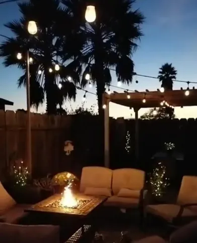 a living room with furniture and a lamp