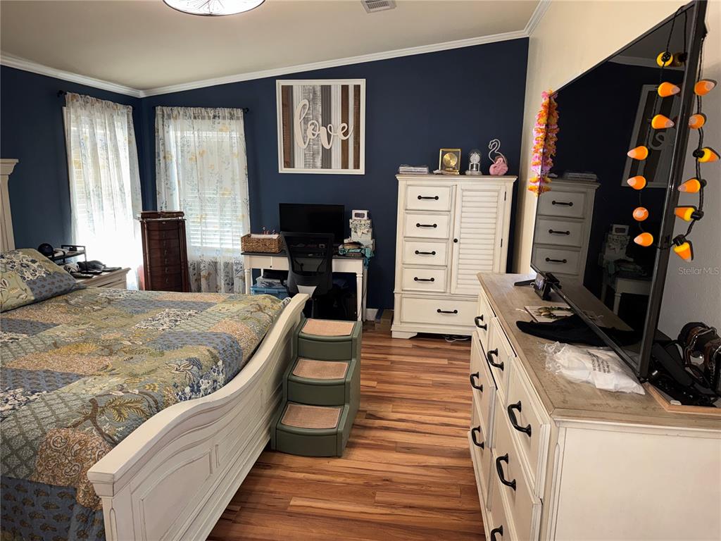 20732 South Grove Loop, Unit 630 Lutz, FL 33558 - Photo 12 of 28 a bedroom with a bed and a closet