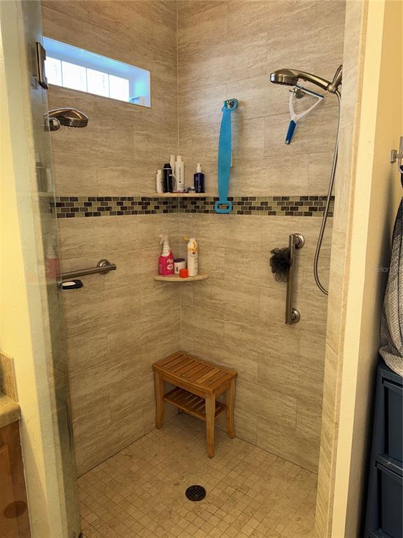 20732 South Grove Loop, Unit 630 Lutz, FL 33558 - Photo 15 of 28 a bathroom with a shower