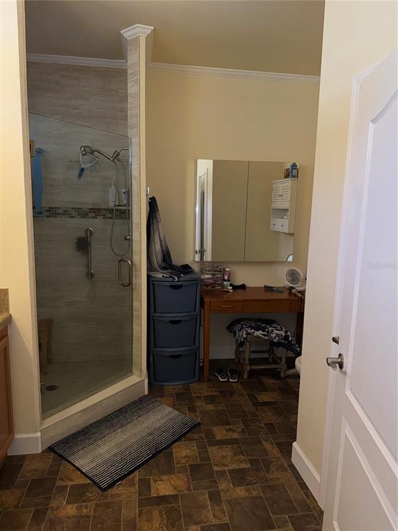 20732 South Grove Loop, Unit 630 Lutz, FL 33558 - Photo 17 of 28 a bathroom with a mirror