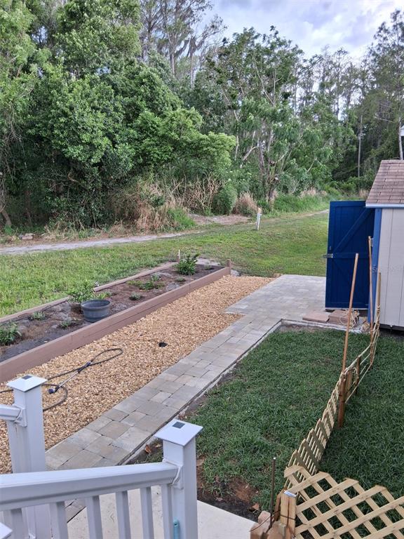 20732 South Grove Loop, Unit 630 Lutz, FL 33558 - Photo 24 of 28 a view of a park with large trees