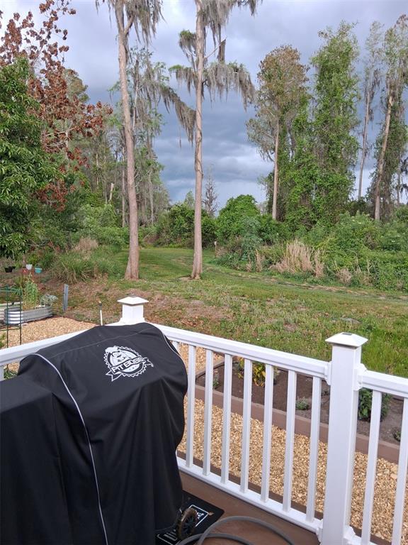 20732 South Grove Loop, Unit 630 Lutz, FL 33558 - Photo 28 of 28 a view of a wooden fence