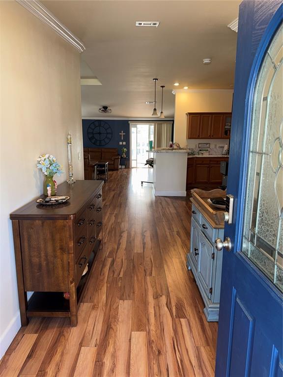 20732 South Grove Loop, Unit 630 Lutz, FL 33558 - Photo 3 of 28 a kitchen with stainless steel appliances a stove a sink dishwasher and a refrigerator