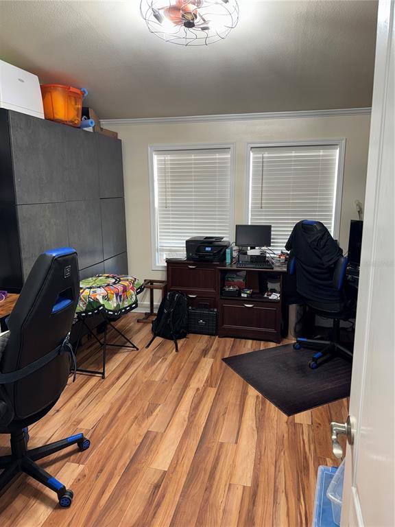 20732 South Grove Loop, Unit 630 Lutz, FL 33558 - Photo 7 of 28 a bed room with furniture and a dresser