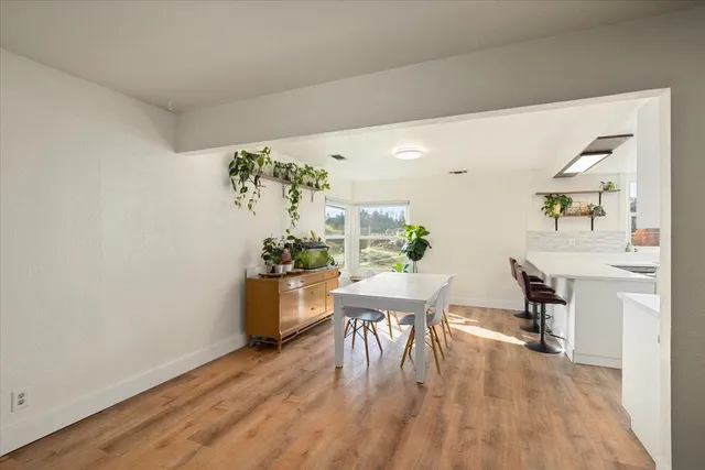 a workspace with furniture and window