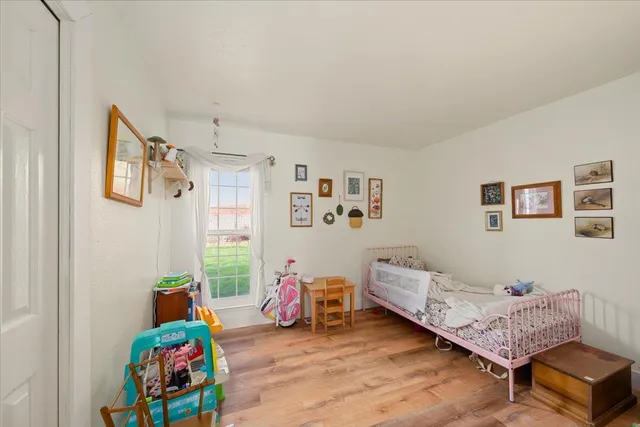 a room with furniture and a wooden floor