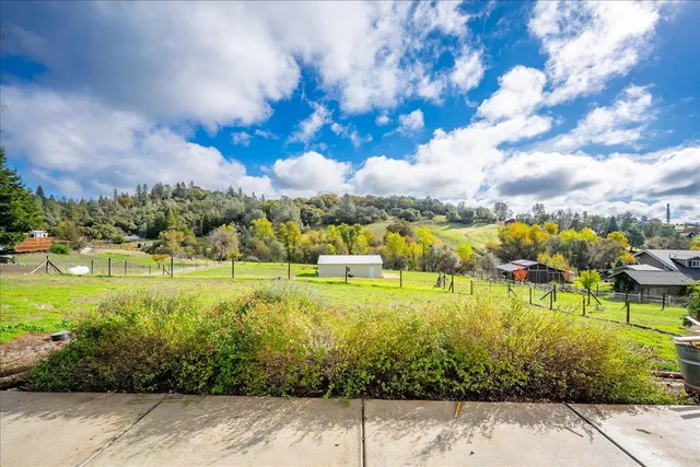 a view of an outdoor space and swimming pool