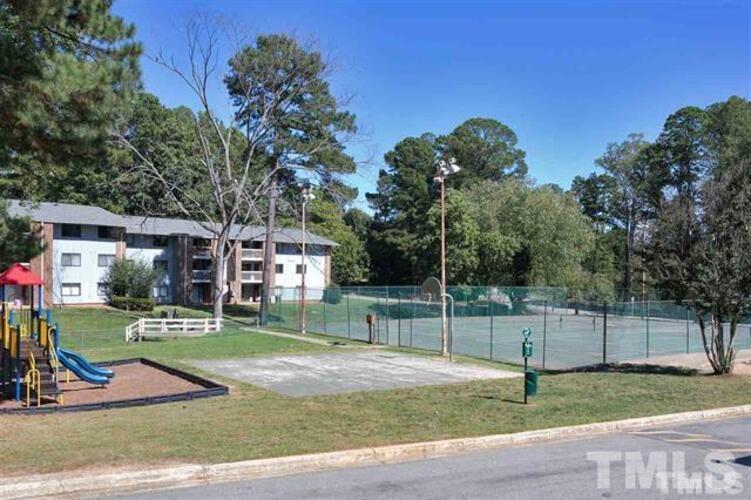 1022 Sandlin Place, Unit A Raleigh, NC 27606 - Photo 2 of 20 a backyard of a house with entertaining space