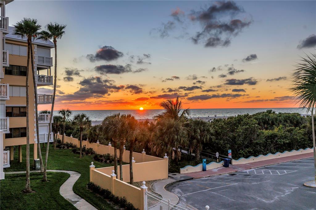 6650 Sunset Way, Unit 207 St. Pete Beach, FL 33706 - Photo 21 of 57 a view of a backyard of the house