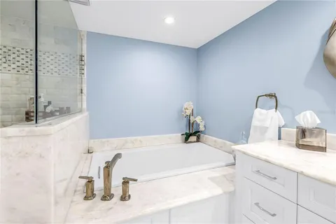 a view of a chairs and table in patio