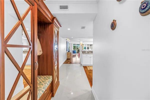 a kitchen with sink and cabinets