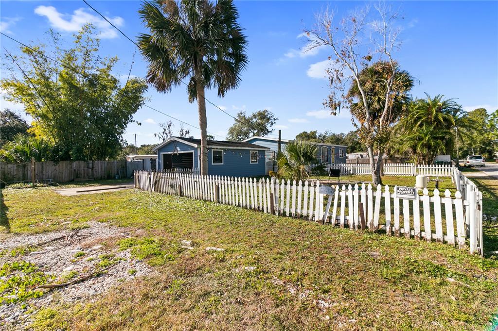 18312 16th Avenue Orlando, FL 32833 - Photo 22 of 26 a view of a swimming pool with a garden