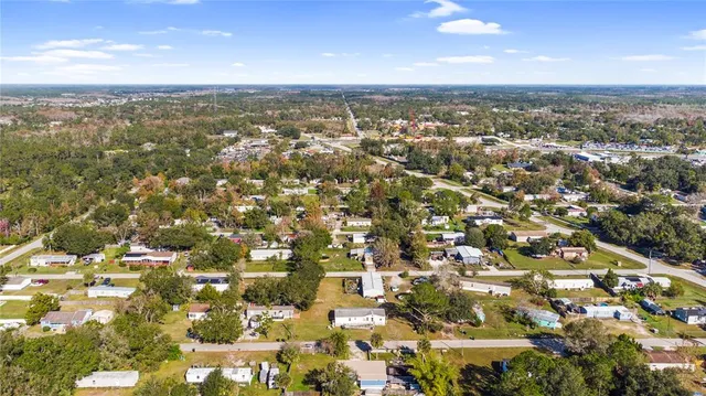 an aerial view of residential building with parking space