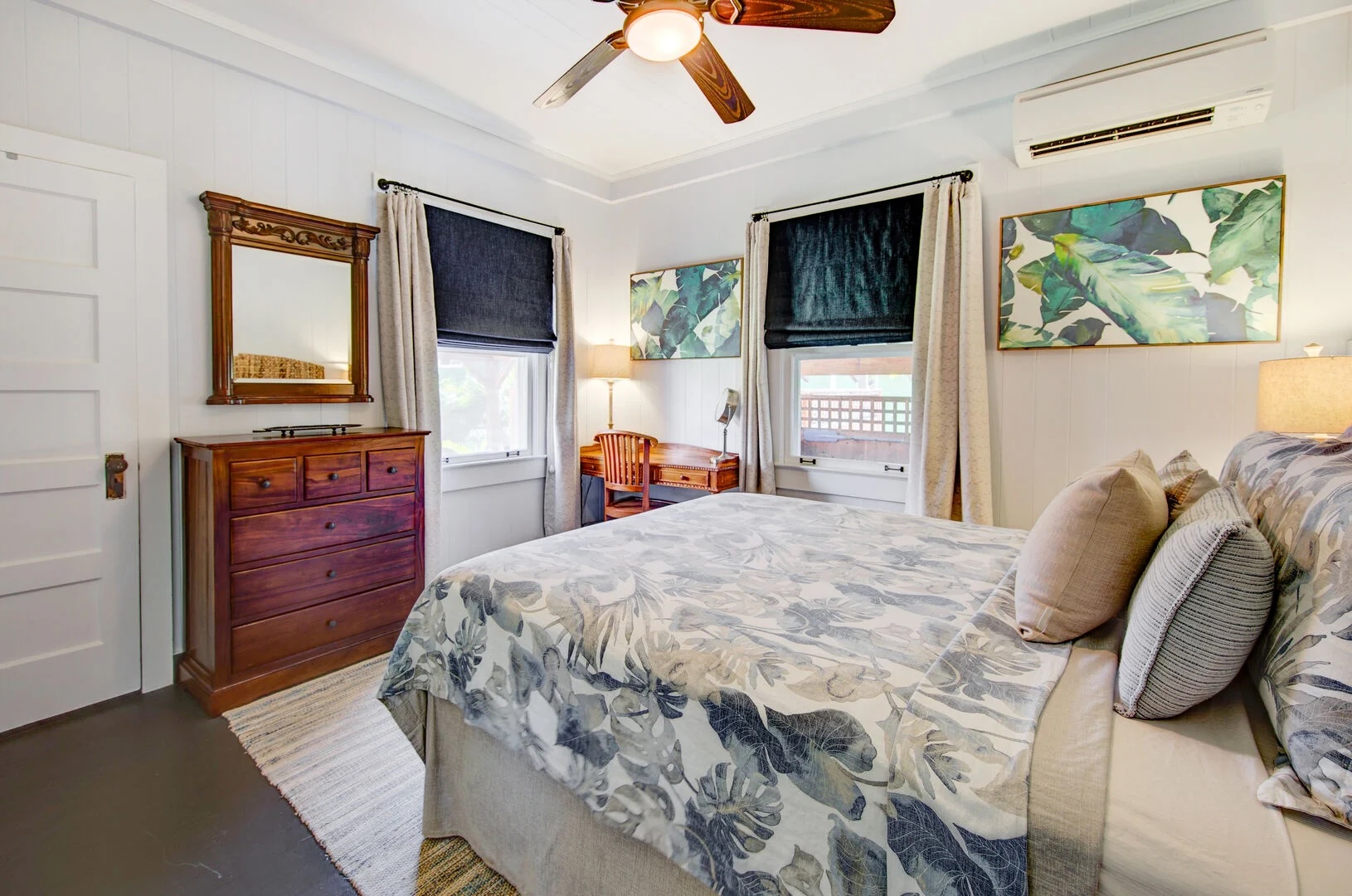 4462 Halepule Road Waimea, HI 96796 - Photo 6 of 11 a bed sitting in a bedroom and furniture next to a window