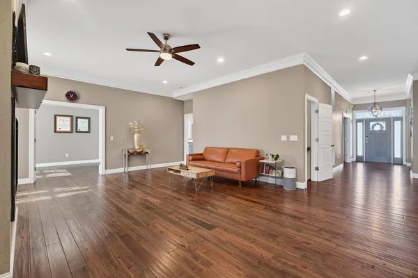 a view of livingroom with furniture and wooden floor
