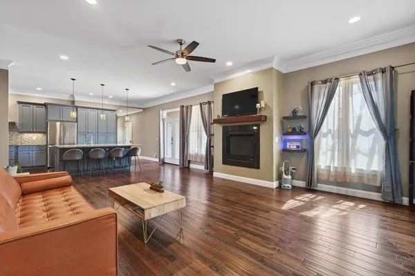 a bedroom with a bed and a tv
