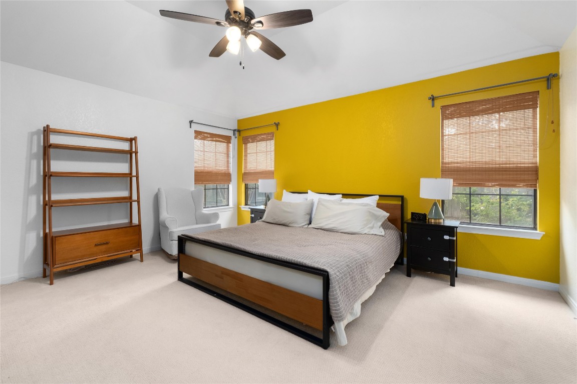 2317 Sycamore Trail Round Rock, TX 78664 - Photo 14 of 31 a spacious bedroom with a bed and a window