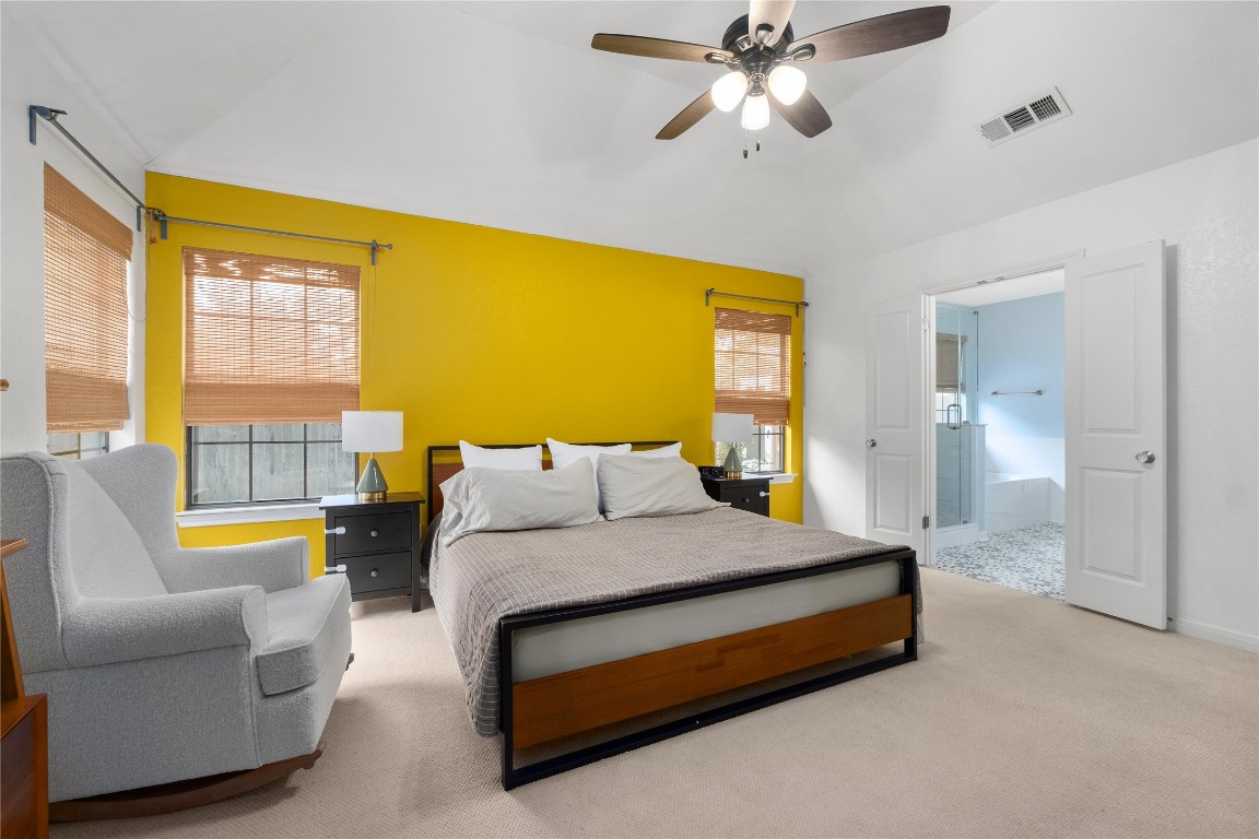 2317 Sycamore Trail Round Rock, TX 78664 - Photo 15 of 31 a spacious bedroom with a bed and a couch