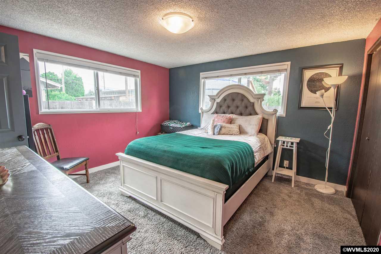 1955 Debra Drive Springfield, OR 97477 - Photo 21 of 27 a bedroom with a bed and window