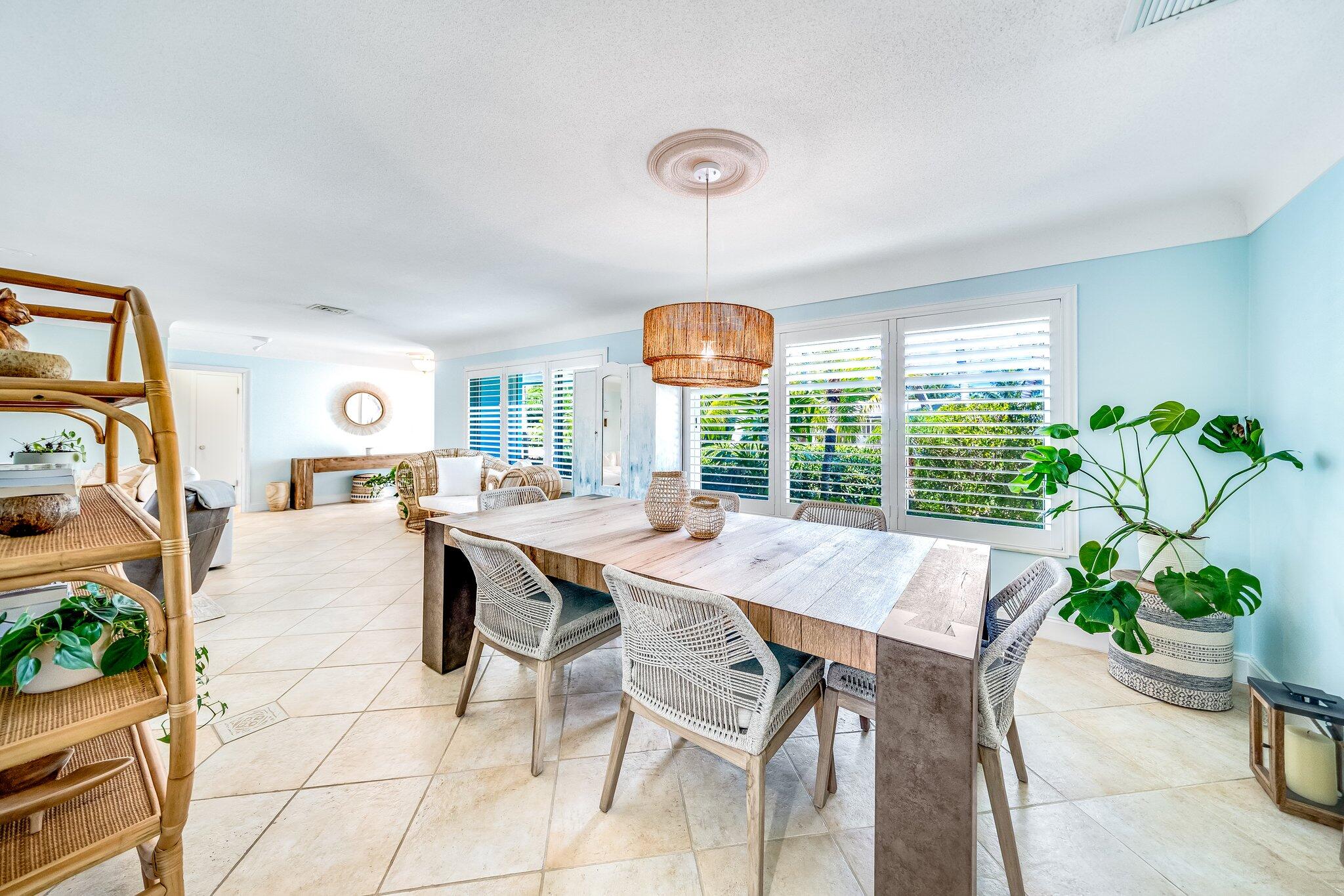 4010 Northeast 25th Avenue Lighthouse Point, FL 33064 - Photo 11 of 57 a view of a dining room with furniture window and outside view