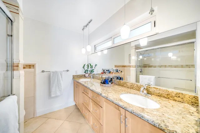 a kitchen with a sink stove and microwave