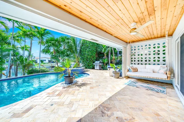 a view of swimming pool from a yard