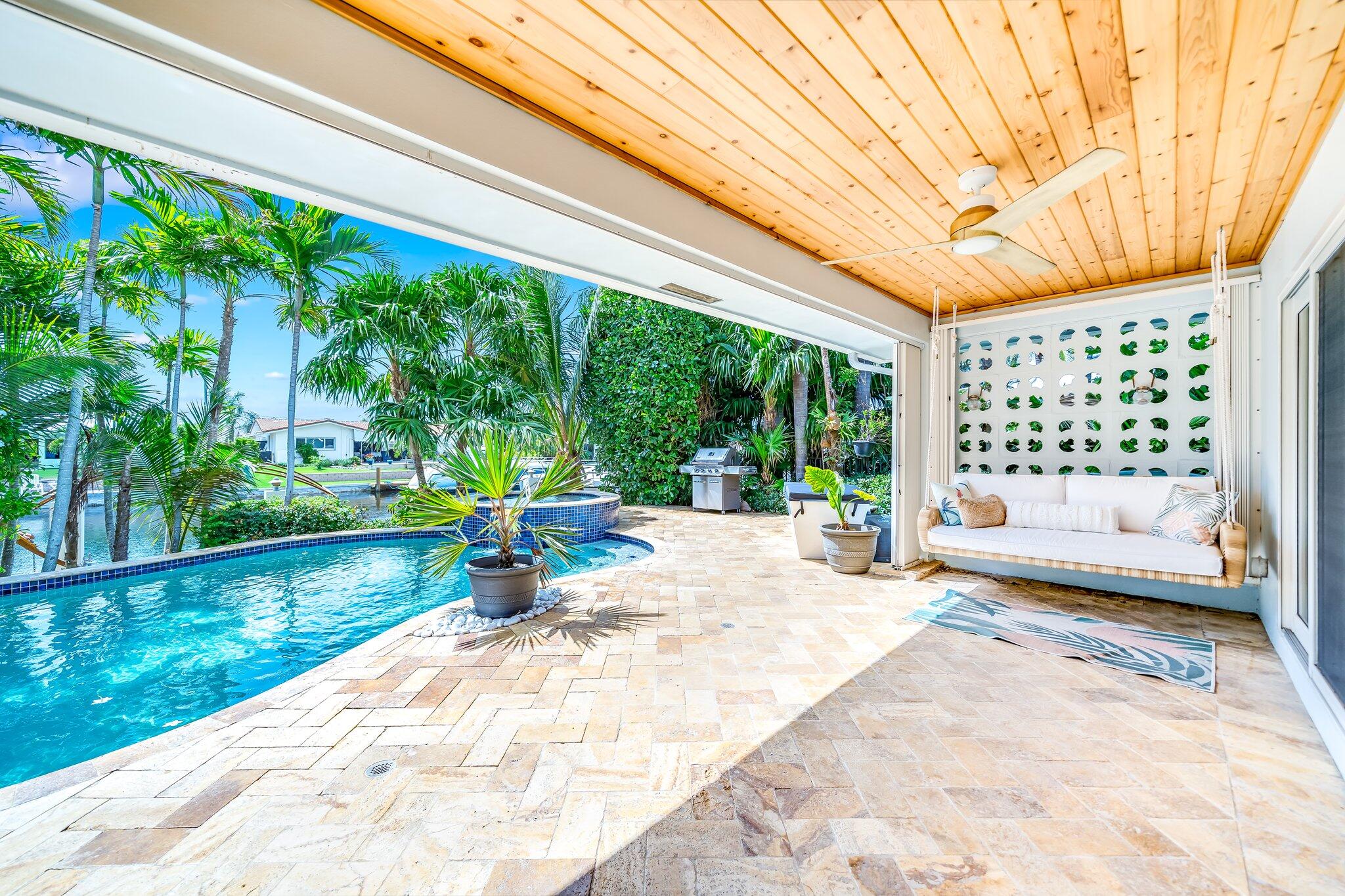 4010 Northeast 25th Avenue Lighthouse Point, FL 33064 - Photo 30 of 57 a view of swimming pool with a patio