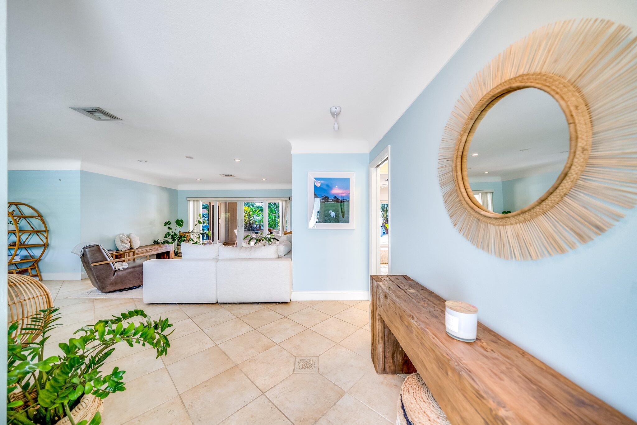 4010 Northeast 25th Avenue Lighthouse Point, FL 33064 - Photo 4 of 57 a living room with furniture and a wooden floor
