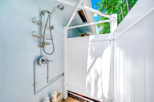 a view of a yard with flower plants