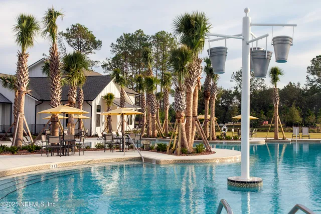 a house with river in front of it