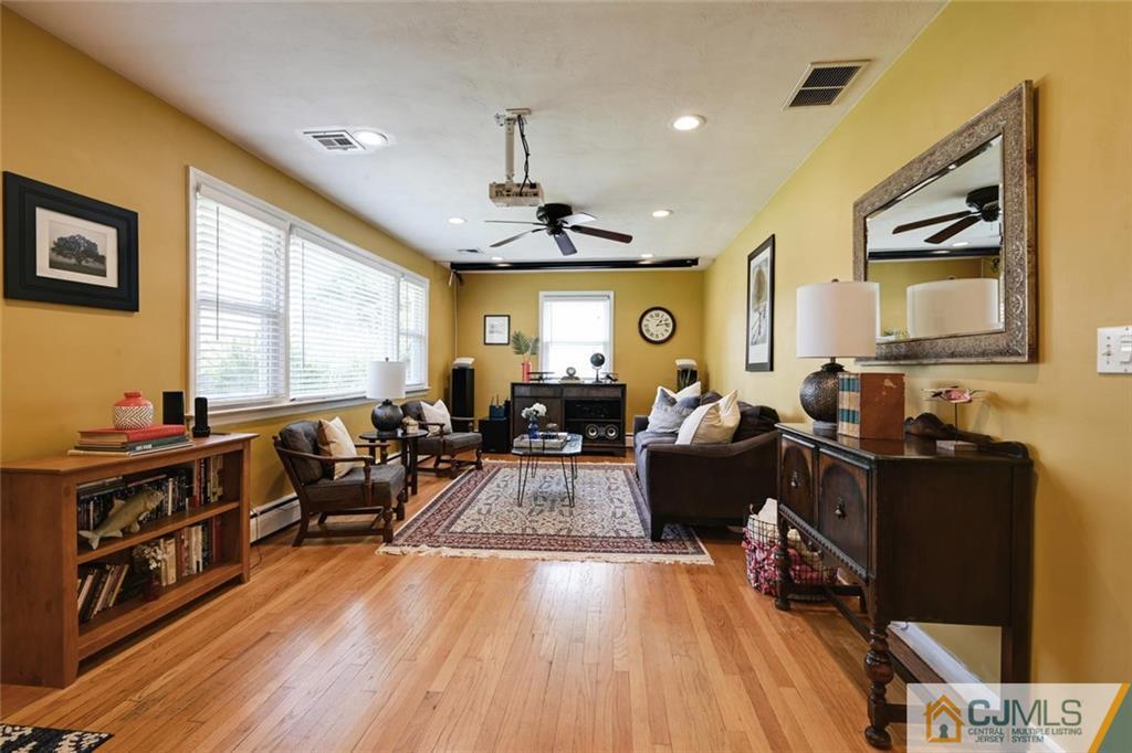 5 Sequola Road Hamilton, NJ 08619 - Photo 3 of 17 a living room with furniture and a large window