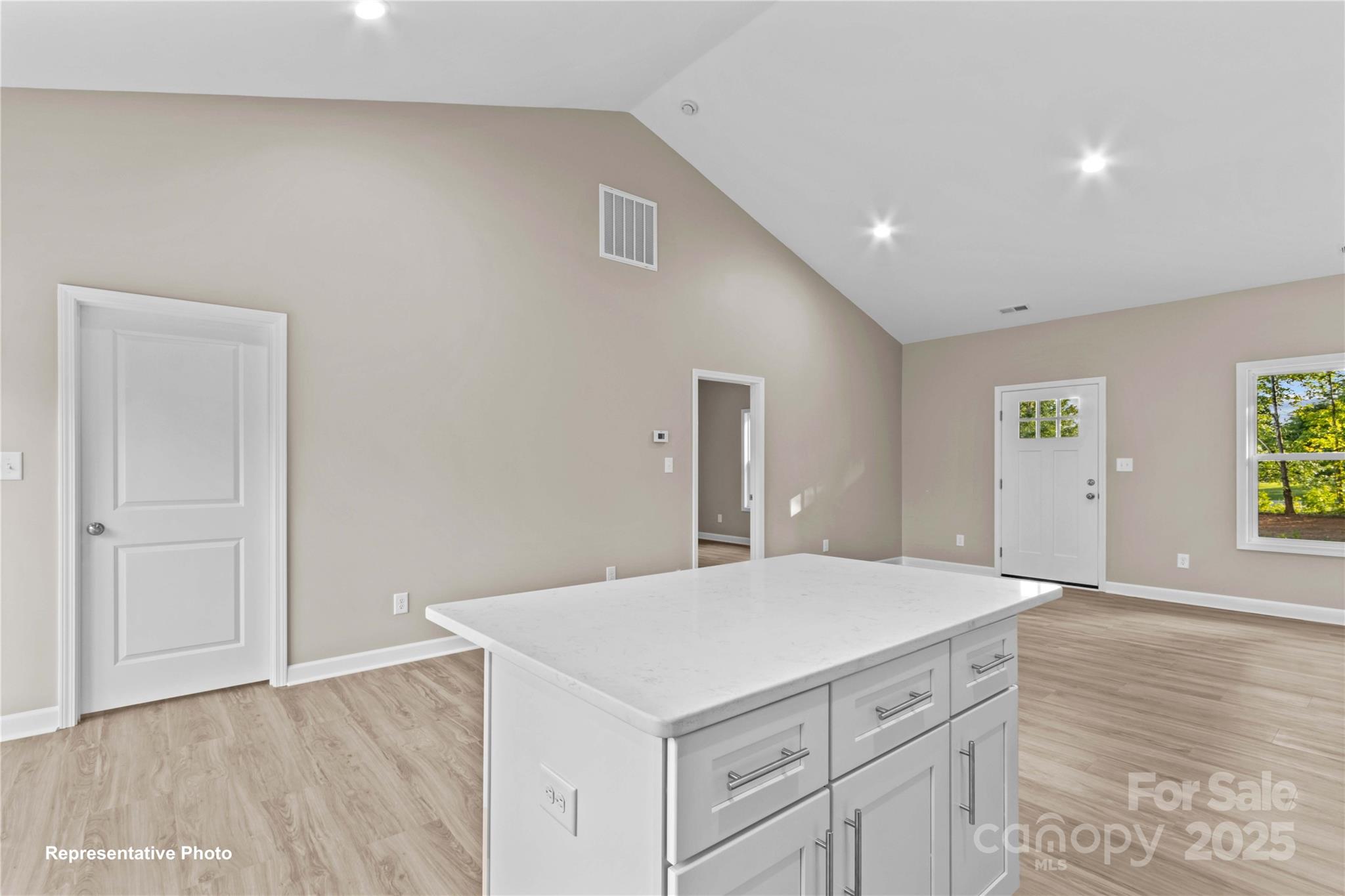 986 Tabor Road Olin, NC 28660 - Photo 12 of 27 a kitchen with a stove and hallway