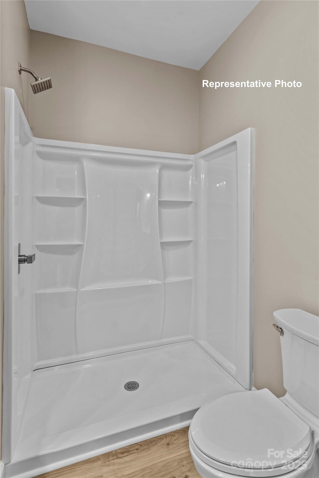 986 Tabor Road Olin, NC 28660 - Photo 17 of 27 a bathroom with a toilet and a shower