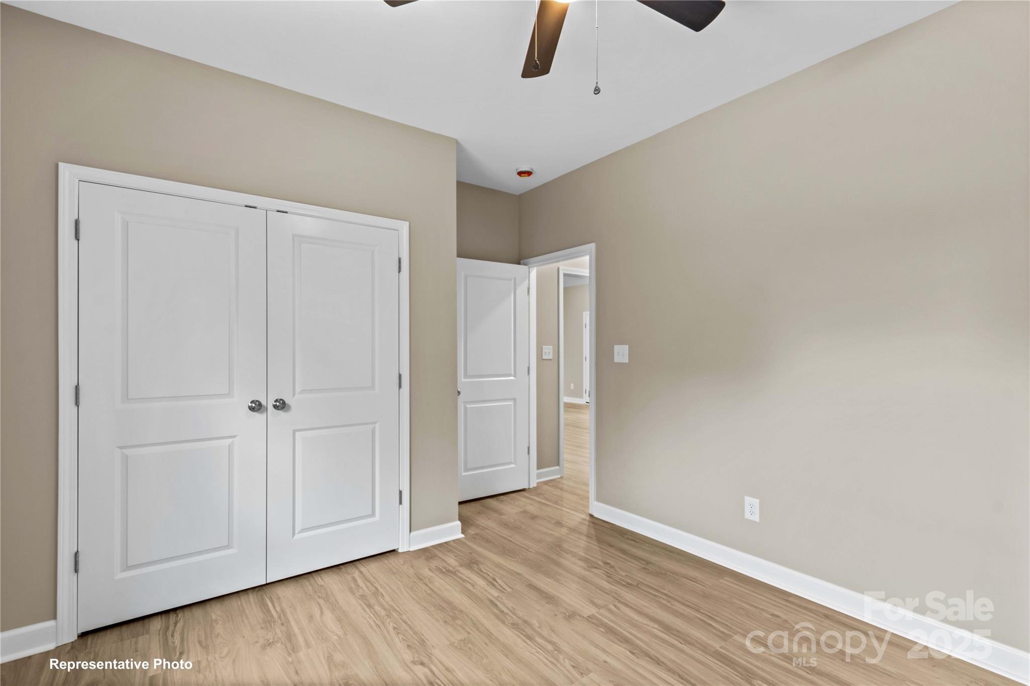 986 Tabor Road Olin, NC 28660 - Photo 20 of 27 a view of an empty room with wooden floor