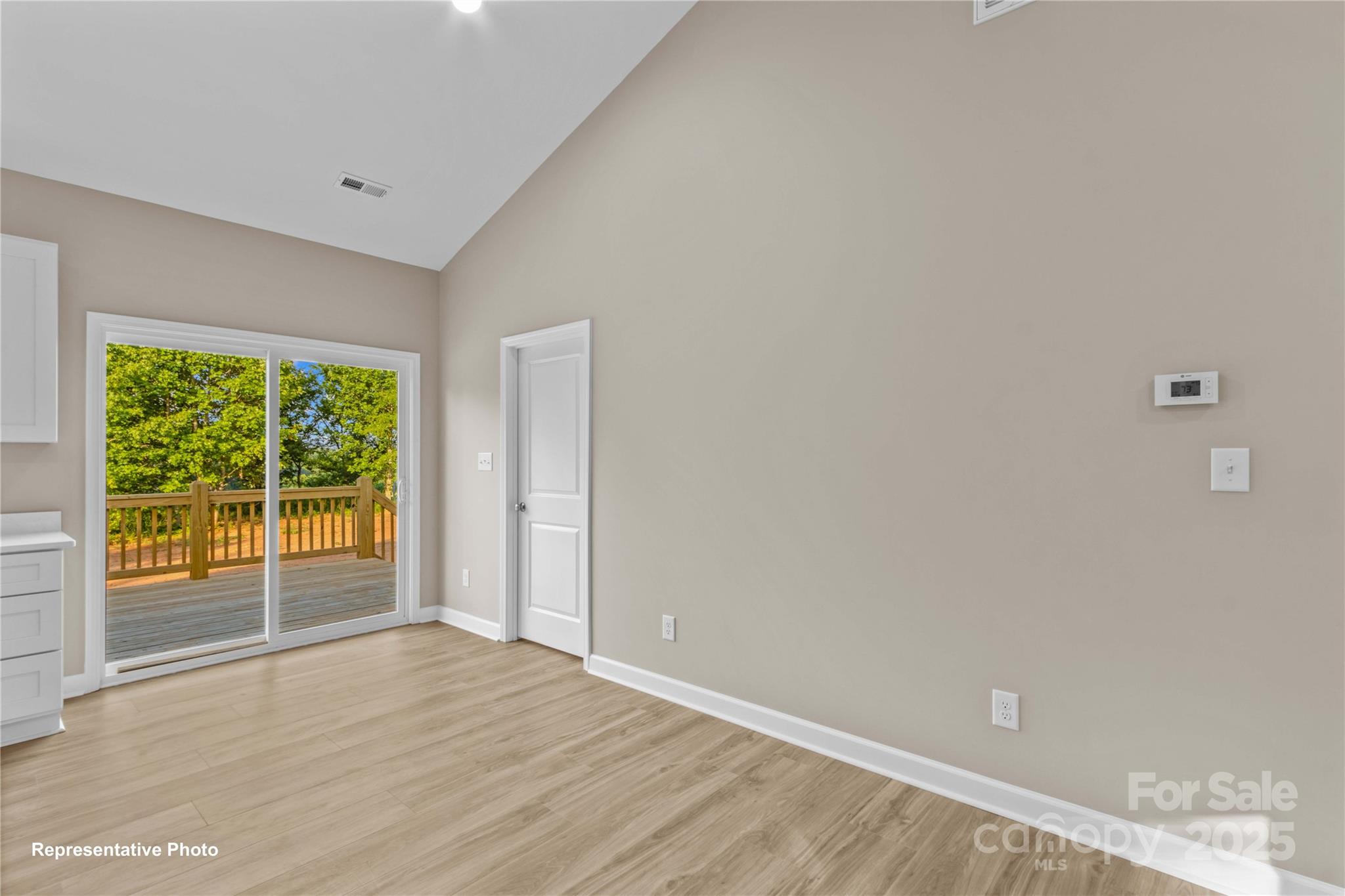 986 Tabor Road Olin, NC 28660 - Photo 6 of 27 a view of an empty room with a window