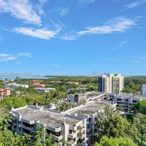 a view of city with tall buildings
