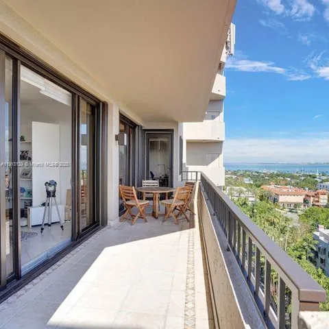 a outdoor space with lots of tables and chairs