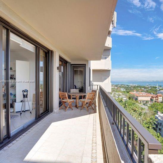 151 Crandon Boulevard, Unit 1130 Key Biscayne, FL 33149 - Photo 29 of 39 a outdoor space with lots of tables and chairs