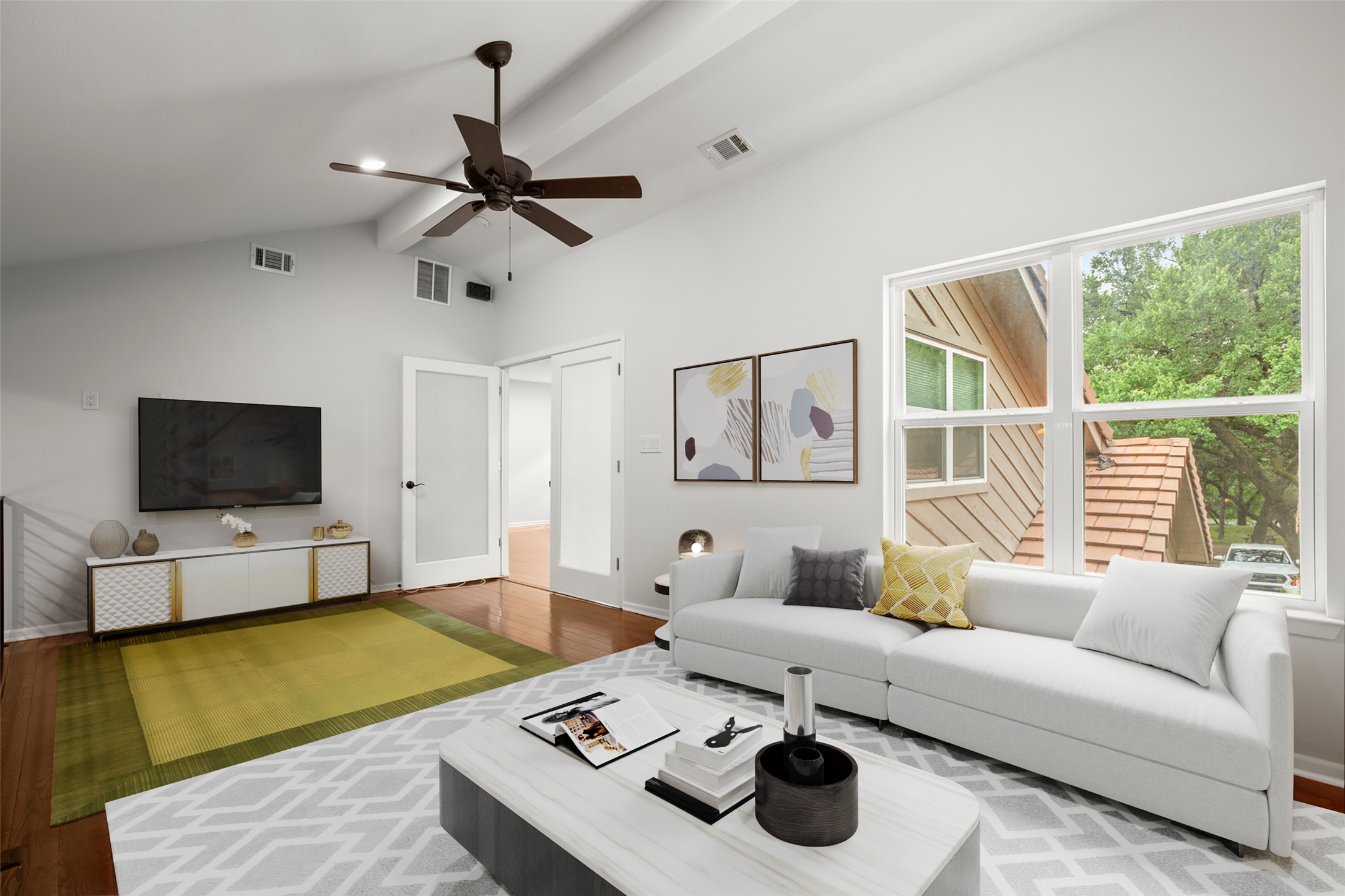 4116 Creek Ledge, Unit 108 Austin, TX 78731 - Photo 28 of 35 The second floor living area offers excellent flexability for use of spaces with privacy glass French doors opening into a large bonus bedroom.