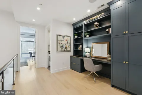 a bathroom with a double vanity sink mirror and double