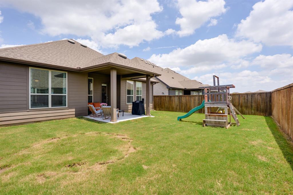 1320 Rosebush Road Aubrey, TX 76227 - Photo 26 of 33 a view of a house with pool and a yard
