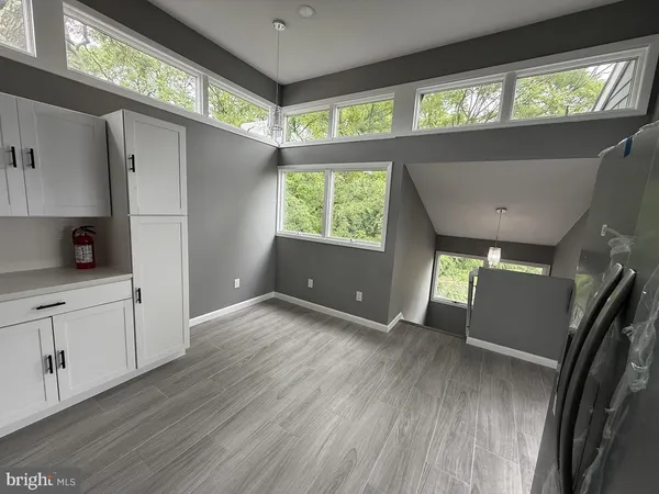 a view of an empty room and window