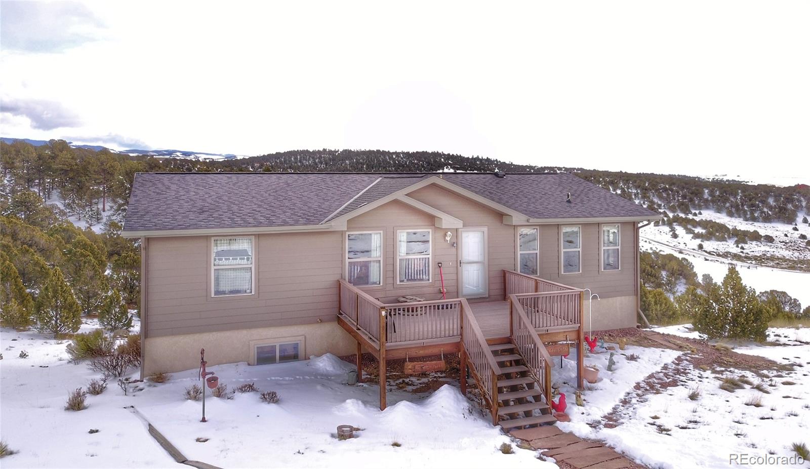 1600 Commanche Road Westcliffe, CO 81252 - Photo 1 of 31 a view of a house with a yard