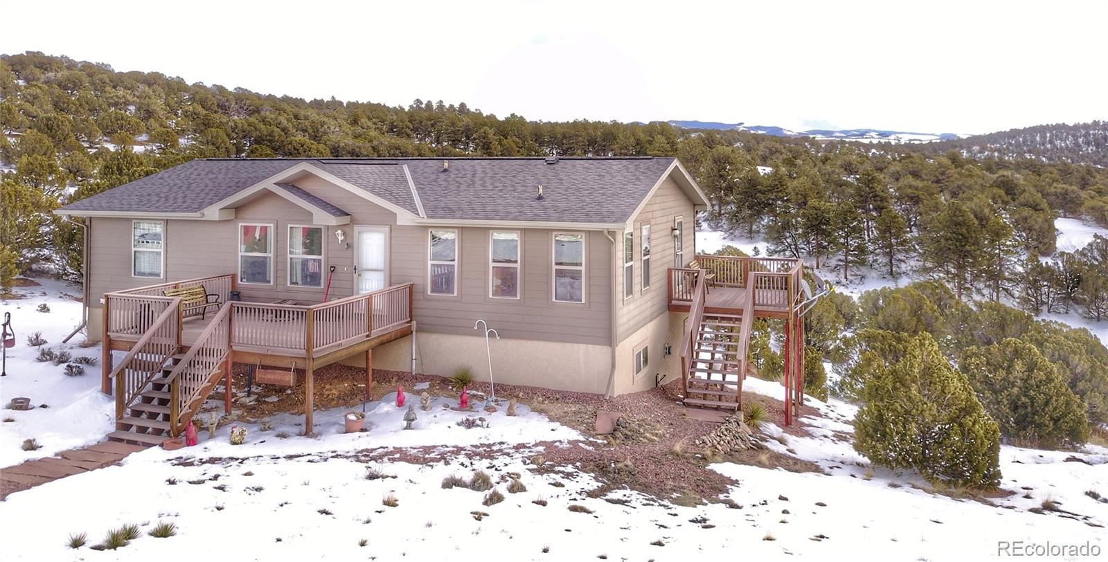 1600 Commanche Road Westcliffe, CO 81252 - Photo 2 of 31 a view of a house with a yard