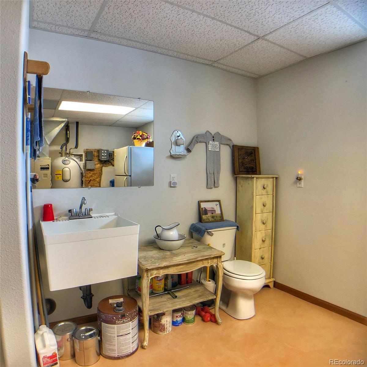 1600 Commanche Road Westcliffe, CO 81252 - Photo 28 of 31 a room with a sink and a stove top oven