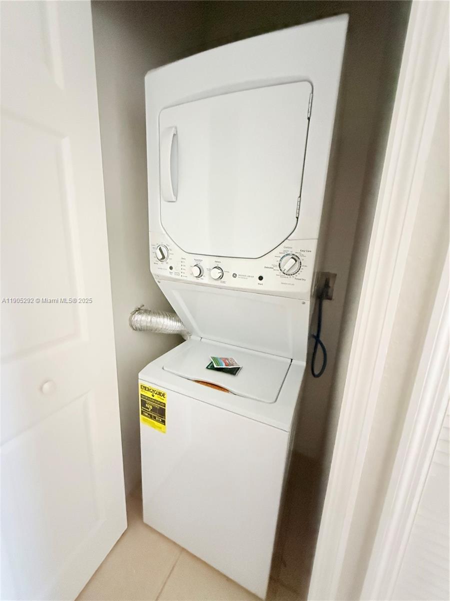 656 Southwest 11th Street, Unit 656 Florida City, FL 33034 - Photo 10 of 18 a utility room with dryer and washer