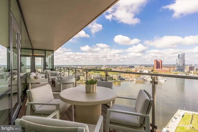a view of a terrace with furniture and a potted plant