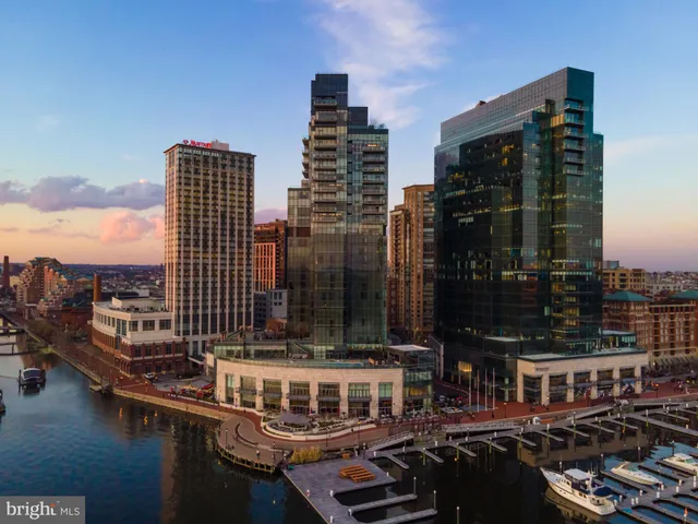a city skyline with tall buildings